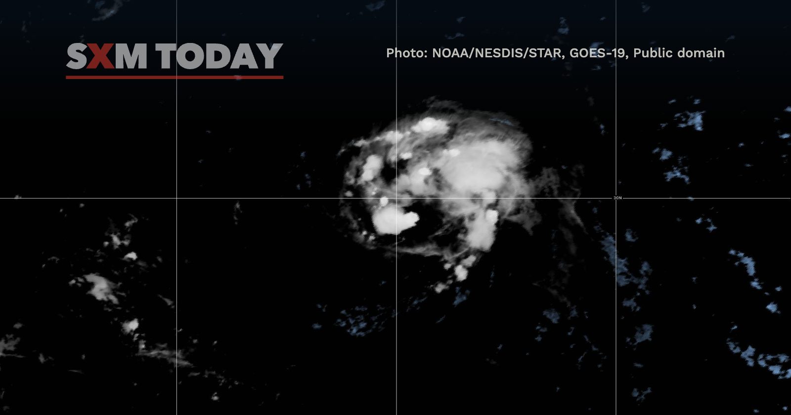 Satellite image of Tropical Storm Fay over the central Atlantic at 11:10pm AST on Wednesday, 23 September: a compact mass of cloud surrounded by dark ocean.