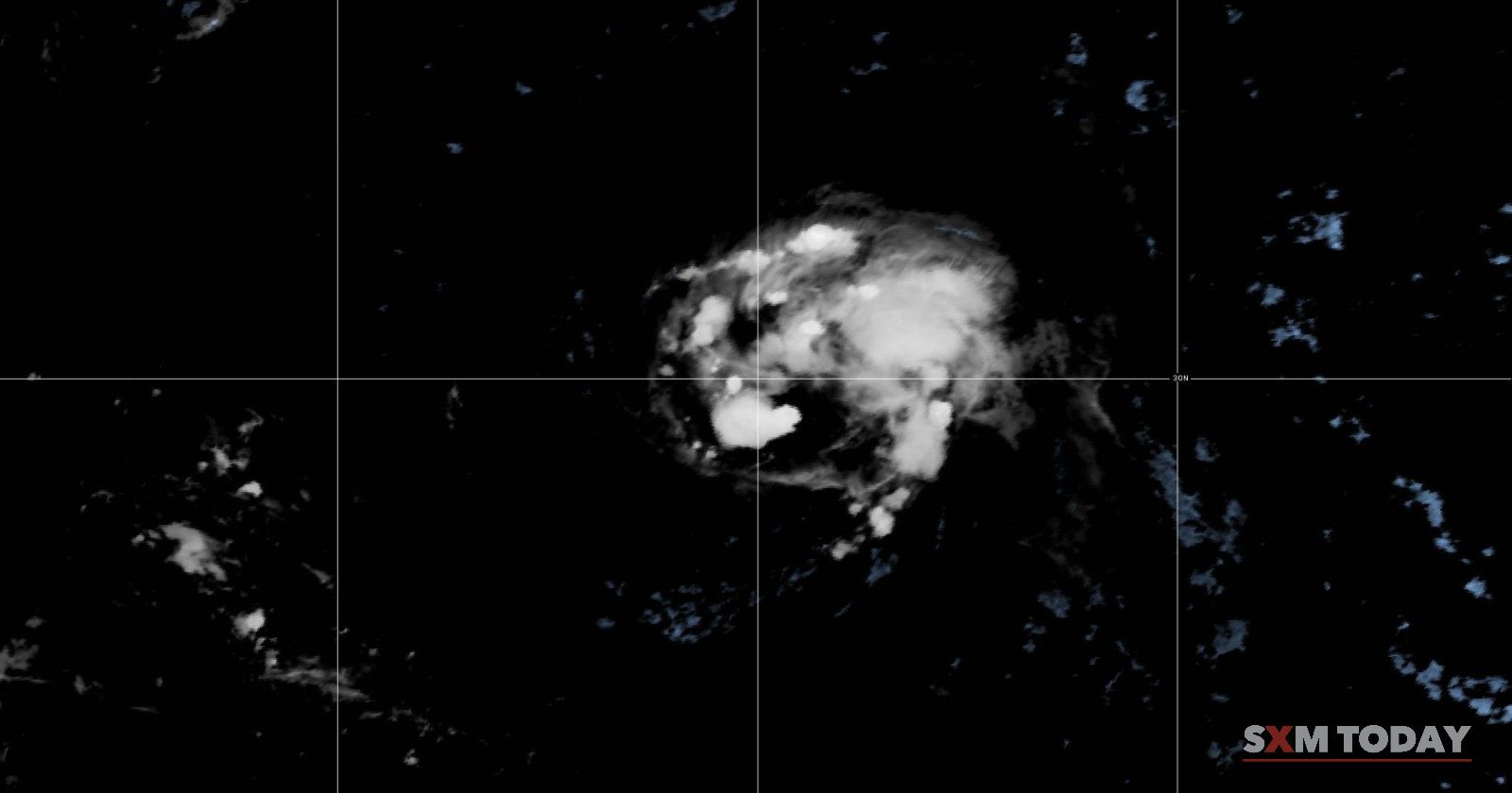 Satellite image of Tropical Storm Fay over the central Atlantic at 11:10pm AST on Wednesday, 23 September: a compact mass of cloud surrounded by dark ocean.